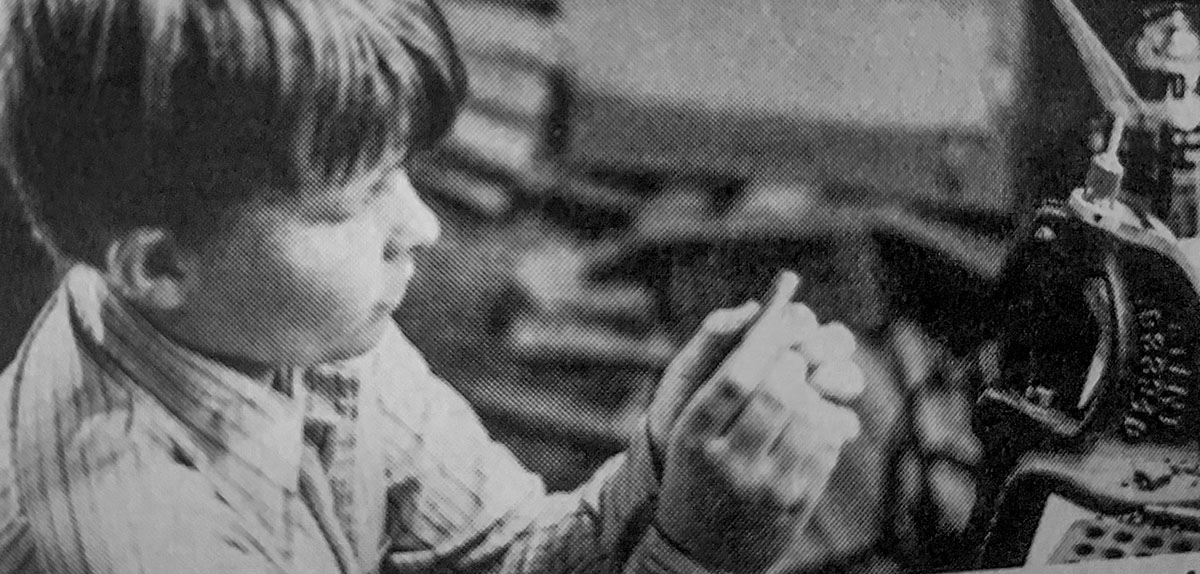 Young Bart holding one of his freshly loaded 45 Colt cartridges.